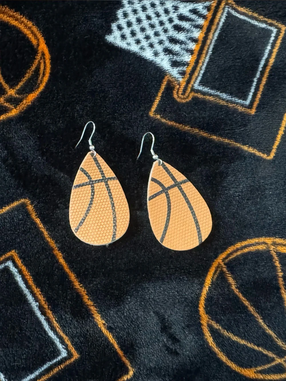 Basketball earrings, blankets & wooden home decor